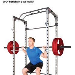 Used Squat Rack(accessories Included)And Barbell/weights. 