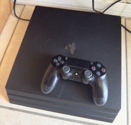 PlayStation 4 Pro Console with Controller