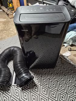 13,500 BTU PORTABLE AIR CONDITIONER.