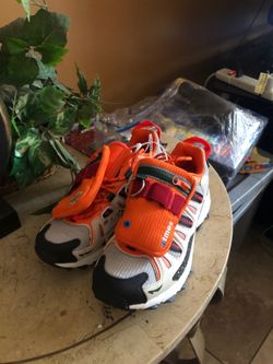 Adidas adiprene super turf adventure shoes.