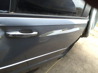 dodge caravan 2014 puerta corredisa del chofer