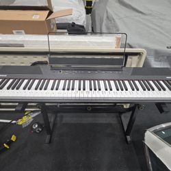 Alesis Keyboard With Adjustable Stand