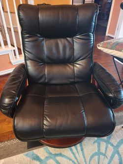 Large swivel recliner armchair