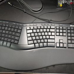 Microsoft wired USB 2. Ergonomic keyboard model 1878 used