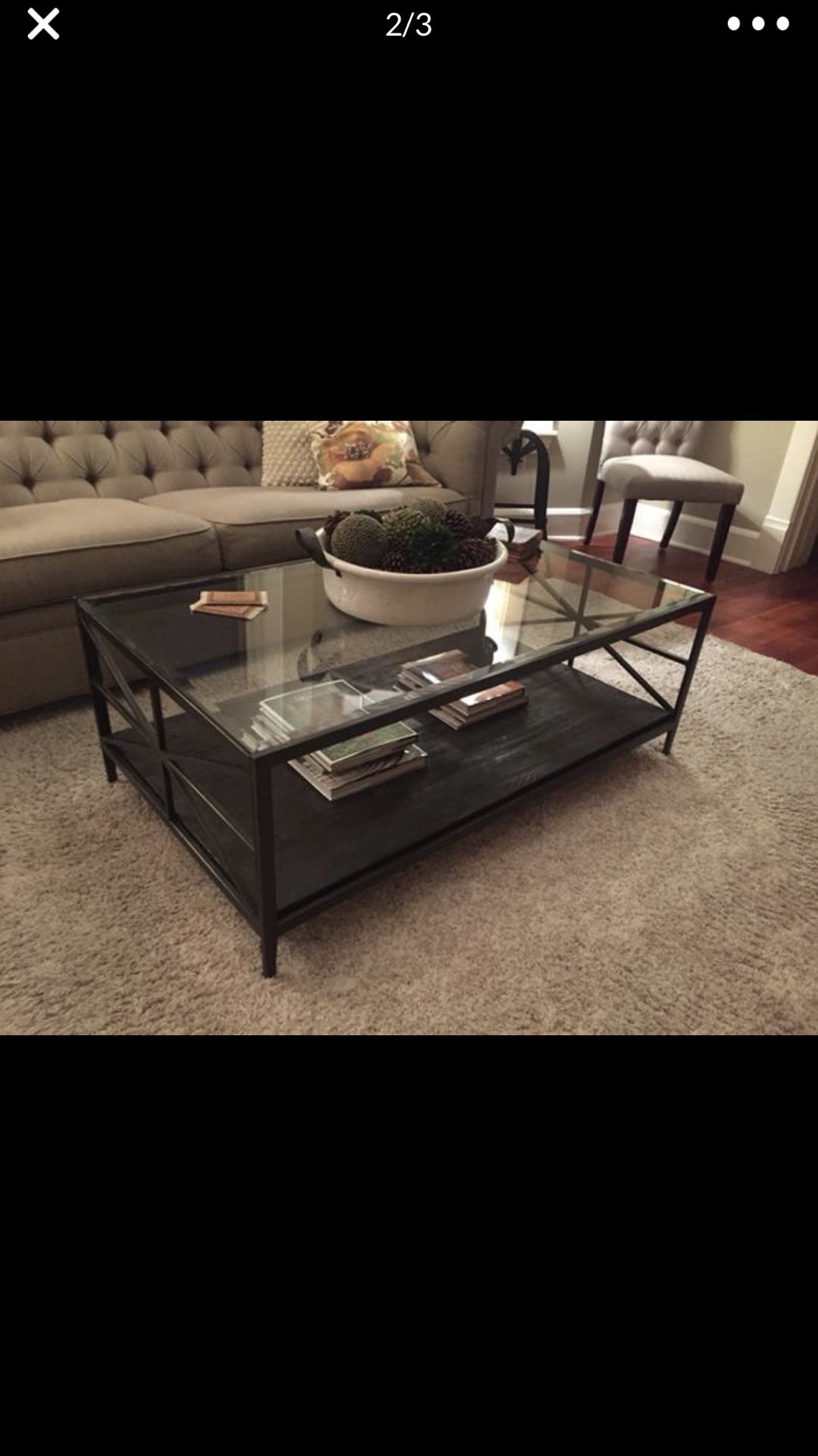 Beautiful glass, metal and wood coffee table! Great condition .