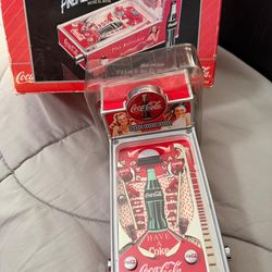 Juego antiguo metal coca cola