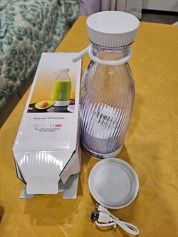 2 new, never used portable rechargeable thick plastic blender with 6 stainless steel blades.