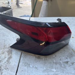 Nissan Versa Left tail Light Oem