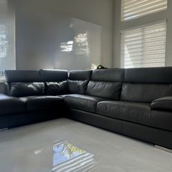 Dark Grey Leather Sectional Good Condition. 