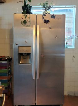 WHIRLPOOL SIDE BY SIDE STAINLESS STEEL REFRIGERATOR-FREE! FREE!!