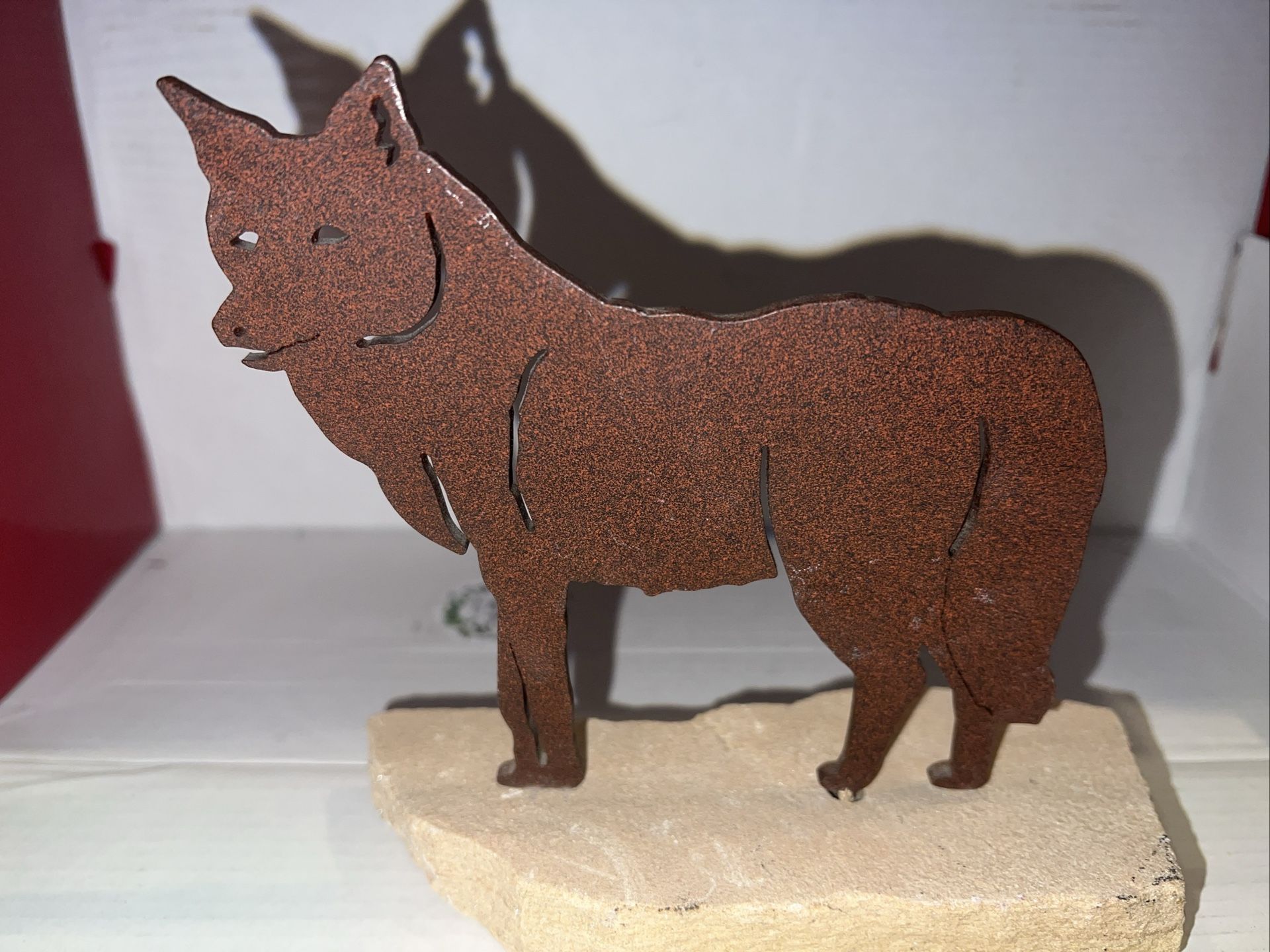 Metal Wolf Figurine On A Large Rock Base