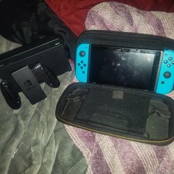Nintendo Switch with Dock, Grip, Case