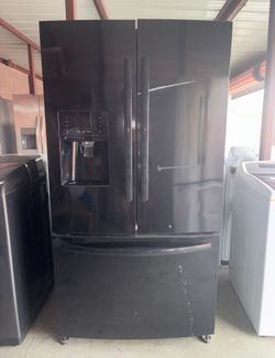 Black Kenmore Refrigerator And Freezer