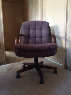 Brown wooden frame red padded rolling office chair