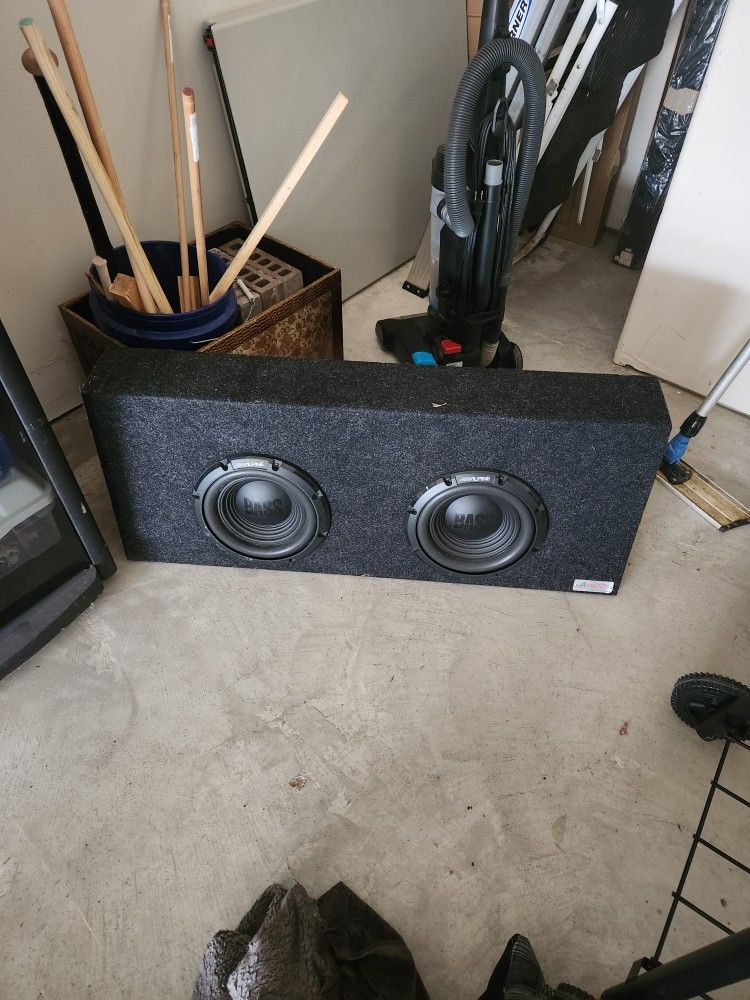 Two Alpine 10" Subwoofers In A Truck Box With Polk Amp