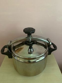 Stainless Steel Pressure Cooker-Clean & Ready To Use