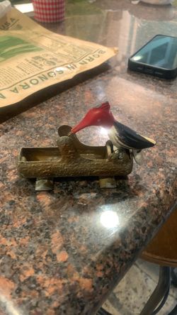 Rare 1950s cast metal woodpecker picks up tooth picks