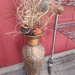 Used Dried flowers in copper two-tone colored vase.