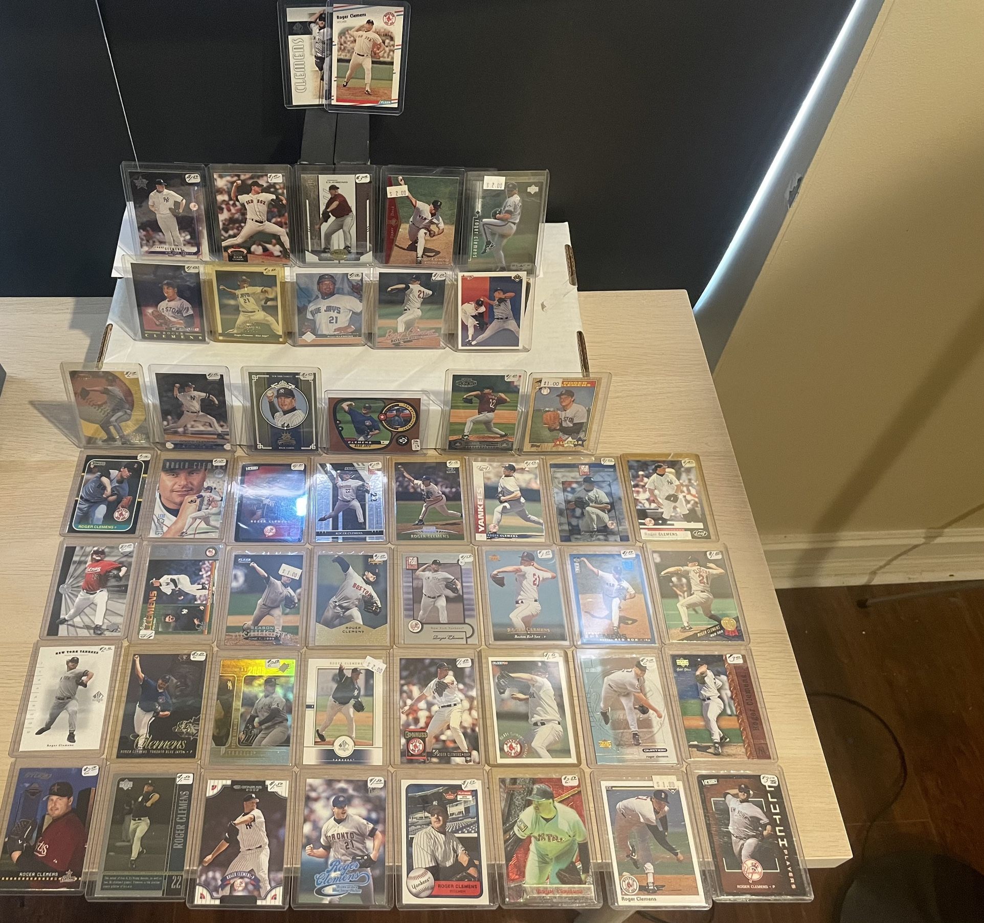 50 Roger Clemens Baseball Card Collection w/plastic cases included