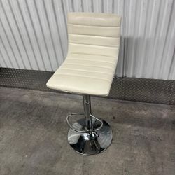 Bar stool  on chrome base … swivels/goes up and down … $30