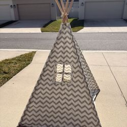Selling a gray kids’ tent.