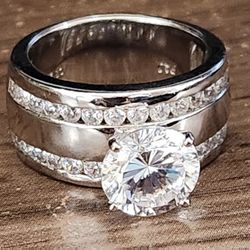 Sterling Silver ring with big sparkly Cubic Zerconia stone 
Size 7