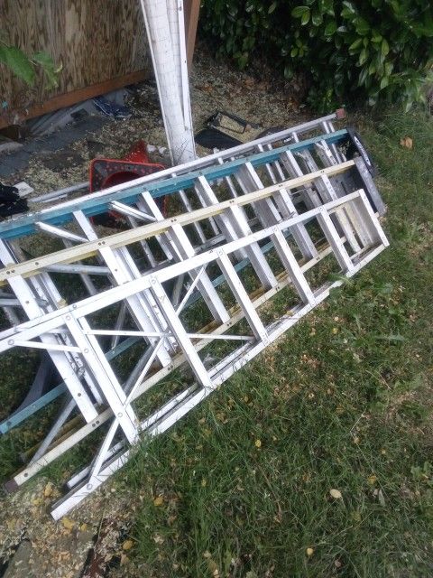 4 Ladders 3 Step Ladders And 1 Extension $100