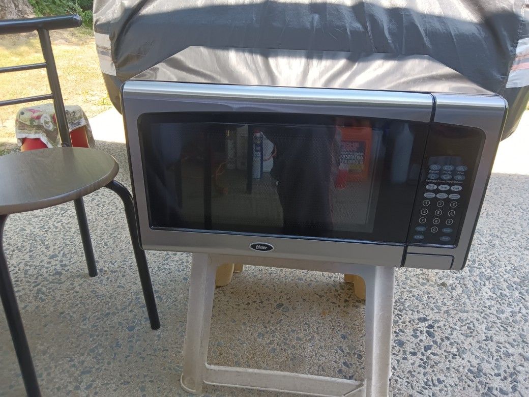 O S T E R Microwave Oven Model Number 0 GJ 41-302