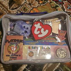a 1999 Ty Beanie Babies Official Club Platinum Membership Kit.