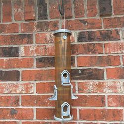 Sturdy bird feeder with multiple feeding ports - $10