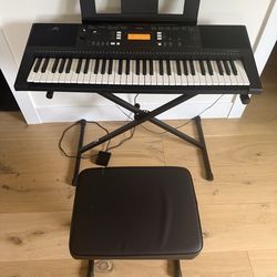Yamaha keyboard and adjustable chair