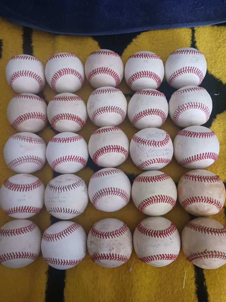 BASEBALLS "BUCKET" OF 25 TOTAL "90 PERCENT" OF THE BALLS ARE LEATHER. LOCATED IN GLENDORA 