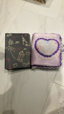 Two Photo Albums One Black One Lavender