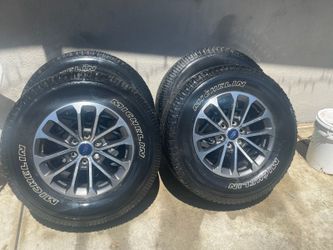 OEM Ford F-150 like new wheels paired with Michelin Primacy XC 275/65R18 tires. $1,150 OBO