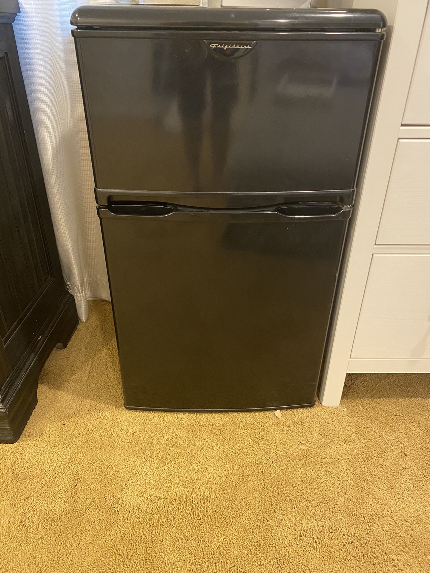 Black mini fridge