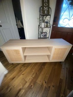Light brown TV stand or console Light brown TV stand or console