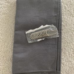 Grey Shower Curtain And Metal Hooks