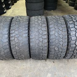 4) LT 295/70/18 Cooper Evolution MT Tires  One Tire is New  Four Tires are unevenly Worn, refer to pics   Load Range E  DOT 1622  5 for $295  I carry 