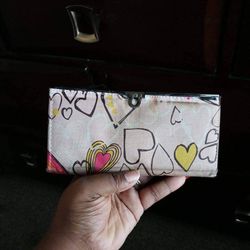Small handheld clutch wallet