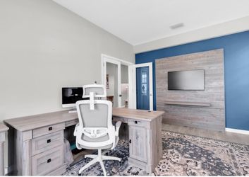 Weathered Grey L-shaped desk and filing cabinet by Sauder