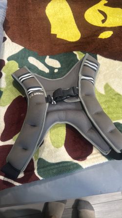 This U.S. ARMY branded weighted vest is a grey