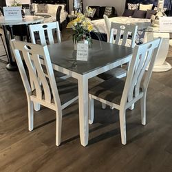 Table And 4 Chairs 