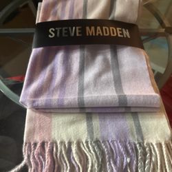 Steve Steve Madden, new purple striped, please scarf or blanket .  New with tag. Shades of purple , pale pink with gray stripes.   Factory Color Fades