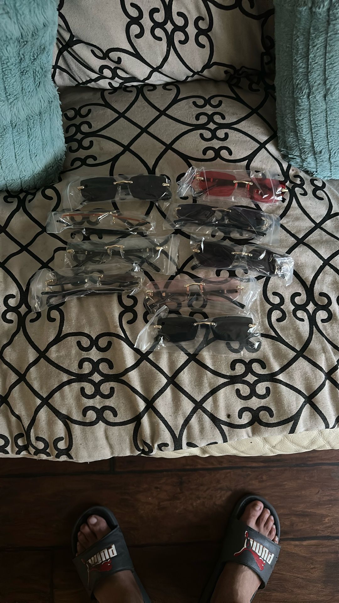 9 Pairs Of Sunglasses All Different Colors