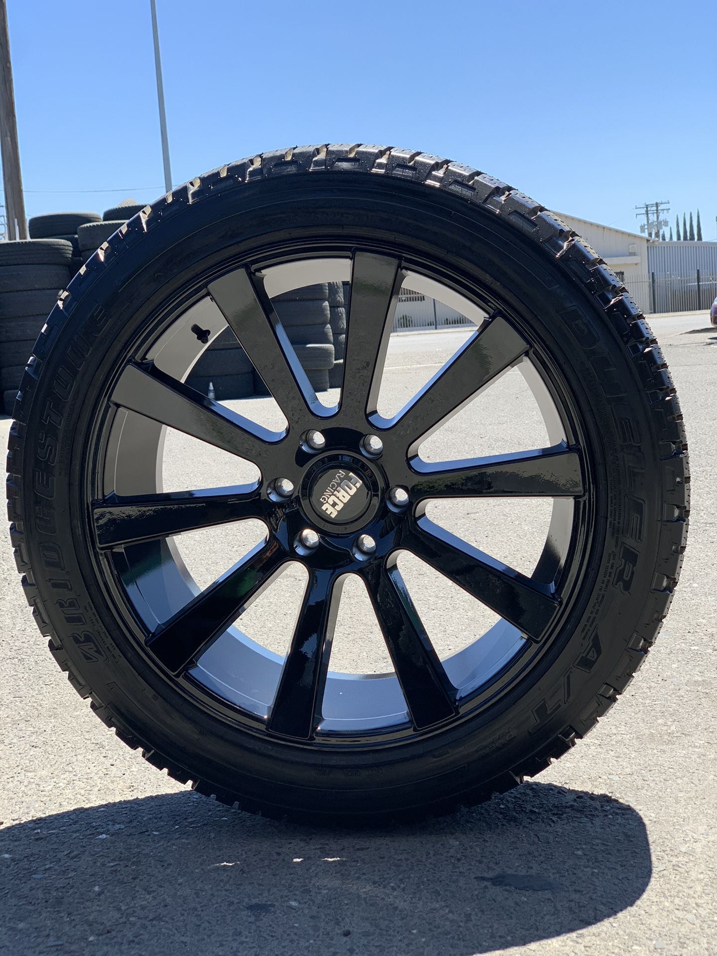 22” all gloss black rims with Bridgestone AT tires 2854522 for sale. 6 lug Escalade avalanche GMC Yukon Sierra Denali