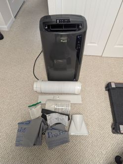 De'Longhi 14,000 BTU (750 sq ft) Portable A/C Air Conditioner with Heat, Remote & Window Kit (MSRP: $699)