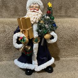 Clothtique Possible Dreams Santa Claus Blue holding tree and gift Figure