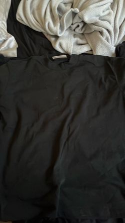 Essentials all black t-shirt, size M but fits Large or even bigger