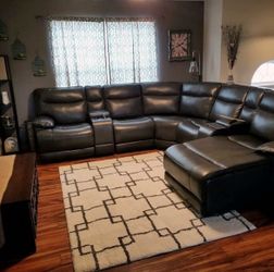Pure leather electric recliner sectional living room set.