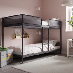 Like new dark gray, twin, medal IKEA bunk bed mattresses included